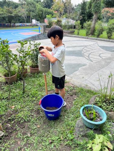 LINE_ALBUM_112學年度原住民族社團＜綠手指＞（低年級）_231225_115.jpg